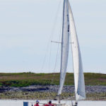 "Irene" off Ballast Island at start of PSYC Regatta.